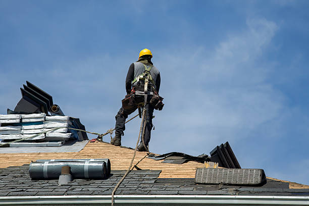 Professional Roof Replacement technician working in Calverton, NY